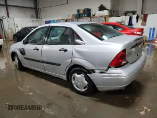 2003 Ford Focus LX z VIN 1FAFP33P03W313279, wystawiony jako Copart lot #89271495 z przebiegiem 152 672 mil mil oraz Szkoda całkowita • Salvage title. Historia ofert i sprzedaży dostępna na DreamBid. Obrazek 2.