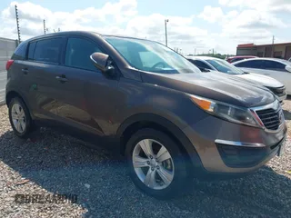2013 Kia Sportage LX with VIN KNDPB3A24D7416706, listed as a IAAI auction lot 42525729 with 166,798 mi miles and . Bid and sale history available at DreamBid. Image 1.