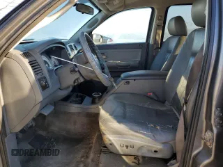 2006 Dodge Dakota SLT with VIN 1D7HW48K46S624630, listed as a Copart auction lot 76592394 with 135,679 mi miles and Salvage Title. Bid and sale history available at carsss.com. Image 7.