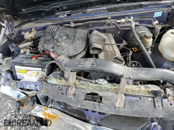 1996 Nissan Frontier XE z VIN 1N6SD11S5TC335953, wystawiony jako Copart lot #49104755 z przebiegiem 216 288 mil mil oraz Szkoda całkowita • Salvage title. Historia ofert i sprzedaży dostępna na DreamBid. Obrazek 11.