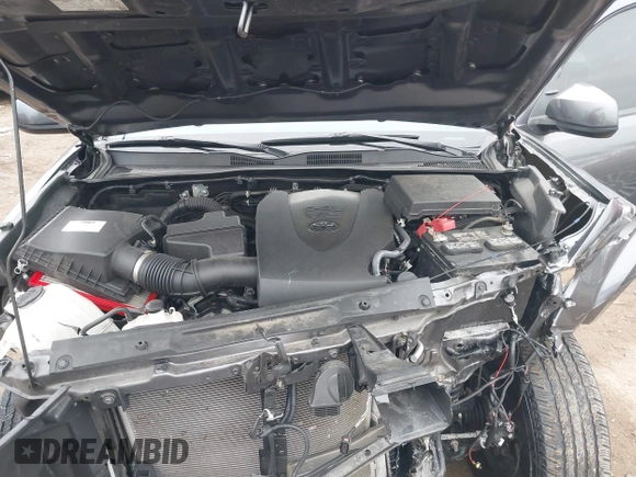 2021 Toyota Tacoma SR z VIN 5TFCZ5AN3MX269374, wystawiony jako IAAI lot #41068356 z przebiegiem 54 358 mil mil oraz . Historia ofert i sprzedaży dostępna na DreamBid. Obrazek 10.