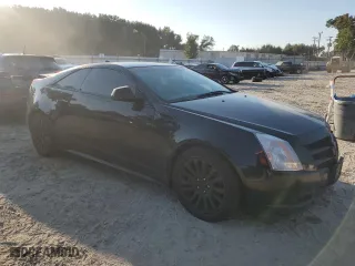 2011 Cadillac CTS Coupe with VIN 1G6DA1ED1B0157235, listed as a Copart auction lot 74232294 with 106,672 mi miles and Salvage Title. Bid and sale history available at carsss.com. Image 4.