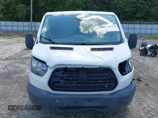 2018 Ford Transit with VIN 1FTYE1YM4JKA83438, listed as a IAAI auction lot 39881520 with 164,789 mi miles and . Bid and sale history available at carsss.com. Image 12.
