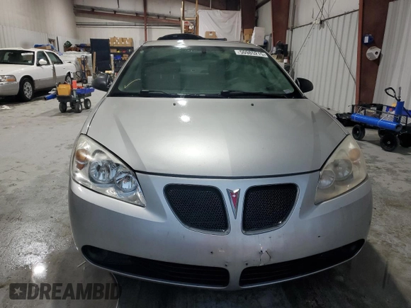 2006 Pontiac G6 with VIN 1G2ZF55B664225896, listed as a Copart auction lot 50985215 with 115,026 mi miles and Salvage title. Bid and sale history available at DreamBid. Image 5.