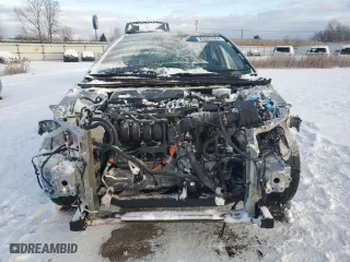 2022 Toyota Camry Hybrid SE with VIN 4T1G31AK7NU586705, listed as a Copart auction lot 83523564 with 56,638 mi miles and Salvage Title. Bid and sale history available at carsss.com. Image 5.