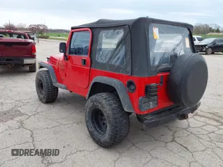 2000 Jeep Wrangler Sport with VIN 1J4FA49S7YP713672, listed as a IAAI auction lot 41924814 with 172,688 mi miles. Bid and sale history available at carsss.com. Image 3.