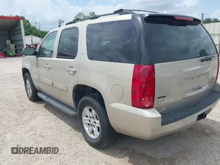 2007 GMC Yukon SLE with VIN 1GKFC13097R327218, listed as a IAAI auction lot 42142633 with 135,206 mi miles and . Bid and sale history available at DreamBid. Image 3.