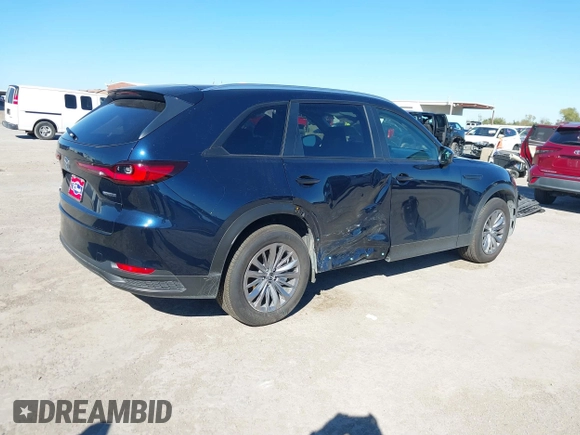 2024 Mazda CX-90 Select z VIN JM3KKAHDXR1170154, wystawiony jako IAAI lot #40852871 z przebiegiem 4 498 mil mil oraz . Historia ofert i sprzedaży dostępna na DreamBid. Obrazek 6.