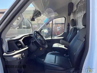 2021 Ford Transit Cargo with VIN 1FTBR1C87MKA05695, listed as a IAAI auction lot 42787001 with 49,167 mi miles and . Bid and sale history available at DreamBid. Image 7.