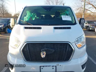 2021 Ford Transit Passenger XL with VIN 1FBAX2Y87MKA64167, listed as a IAAI auction lot 41087474 with 67,242 mi miles and . Bid and sale history available at DreamBid. Image 12.