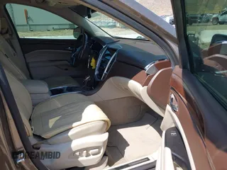 2016 Cadillac SRX Luxury Collection с VIN 3GYFNBE35GS572110, выставлен на аукционе IAAI как лот 42464914 с пробегом 176 670 миль миль и . История ставок и продаж доступна на DreamBid. Изображение 5.