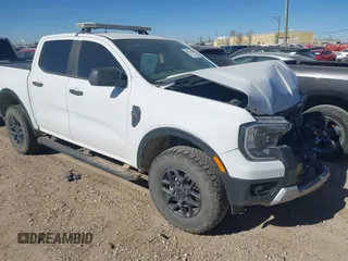 2024 Ford Ranger XLT with VIN 1FTER4HHXRLE19627, listed as a IAAI auction lot 41615448 with 50,476 mi miles. Bid and sale history available at carsss.com. Image 1.