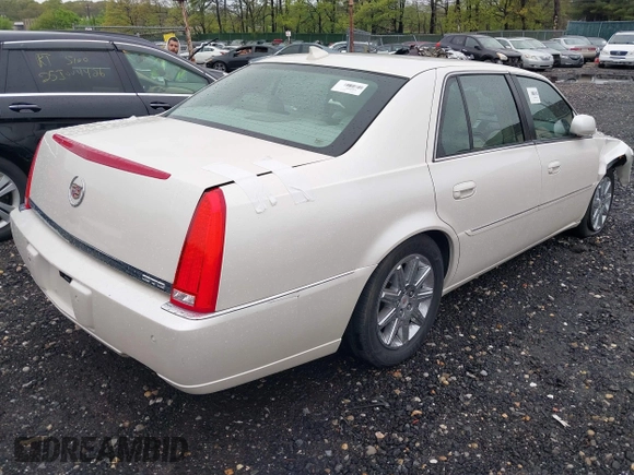 2010 Cadillac DTS 1SD z VIN 1G6KH5EYXAU121435, wystawiony jako IAAI lot #42175287 z przebiegiem Nie podano mil oraz . Historia ofert i sprzedaży dostępna na DreamBid. Obrazek 4.