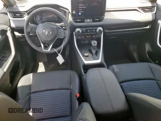 2023 Toyota RAV4 Hybrid XSE with VIN 2T3E6RFV5PW043640, listed as a Copart auction lot 64097125 with 13,686 mi miles and Salvage title. Bid and sale history available at DreamBid. Image 8.