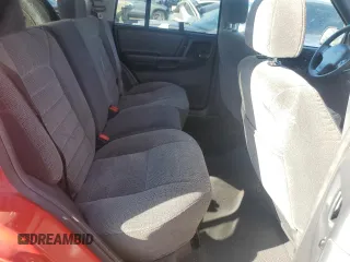 1997 Jeep Grand Cherokee Laredo with VIN 1J4GZ58S1VC760400, listed as a Copart auction lot 43932815 with 108,112 mi miles and Salvage Title. Bid and sale history available at carsss.com. Image 11.
