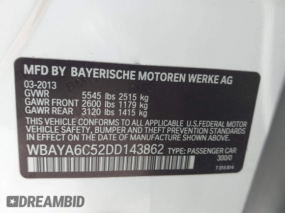 2013 BMW 7 Series 740i with VIN WBAYA6C52DD143862, listed as a IAAI auction lot 41859183 with 133,666 mi miles. Bid and sale history available at carsss.com. Image 9.