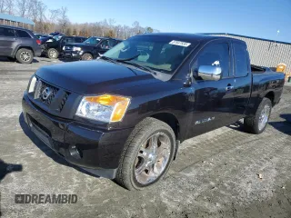 2014 Nissan Titan SE with VIN 1N6BA0CH3EN504833, listed as a Copart auction lot 87847835 with 112,217 mi miles and Salvage Title. Bid and sale history available at carsss.com. Image 1.