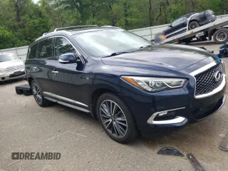 2019 Infiniti QX60 Luxe with VIN 5N1DL0MN4KC560857, listed as a Copart auction lot 52021725 with 104,013 mi miles and Salvage Title. Bid and sale history available at DreamBid. Image 4.