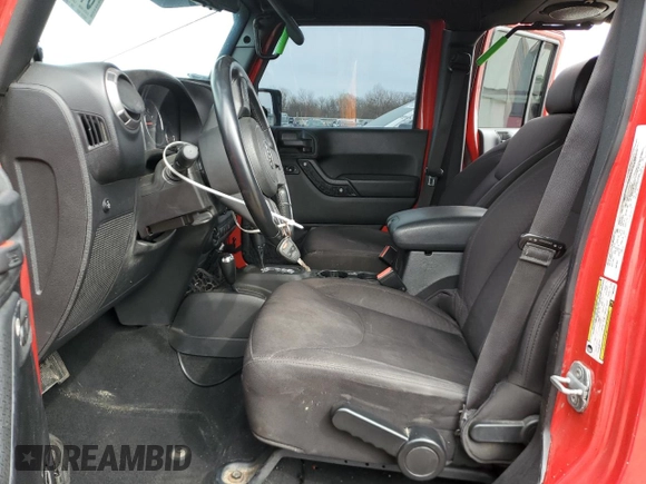 2014 Jeep Wrangler Unlimited Sport with VIN 1C4BJWDG4EL115321, listed as a Copart auction lot 51297255 with 176,685 mi miles and Salvage Title. Bid and sale history available at carsss.com. Image 7.