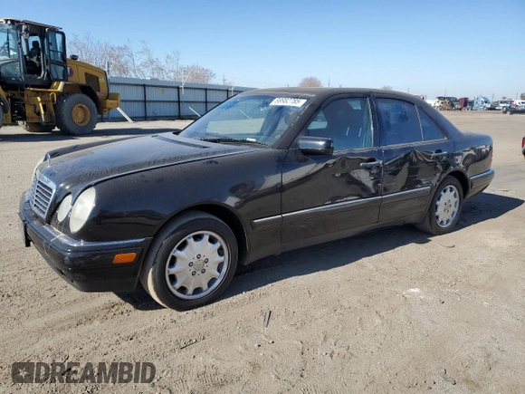 1998 Mercedes-Benz E-Class with VIN WDBJF65F4WA646422, listed as a Copart auction lot 88982785 with 281,524 mi miles and Salvage Title. Bid and sale history available at carsss.com. Image 1.