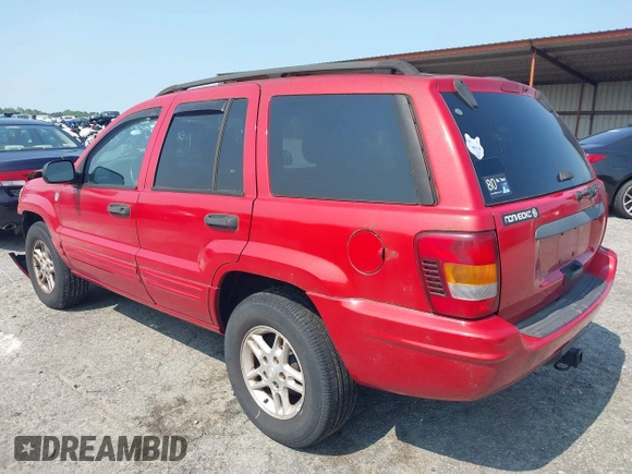 2004 Jeep Grand Cherokee Laredo with VIN 1J4GW48S24C357110, listed as a IAAI auction lot 42395691 with 160,132 mi miles and . Bid and sale history available at DreamBid. Image 3.