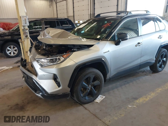 2021 Toyota RAV4 Hybrid XSE with VIN JTME6RFV9MJ006665, listed as a IAAI auction lot 41964182 with 61,654 mi miles and . Bid and sale history available at DreamBid. Image 6.