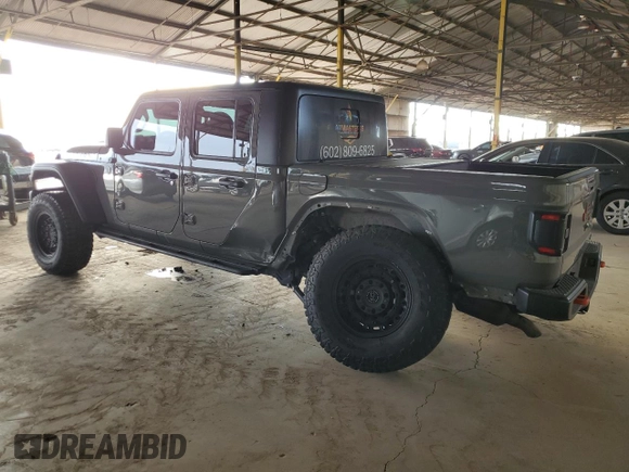2020 Jeep Gladiator Mojave with VIN 1C6JJTEG1LL202459, listed as a Copart auction lot 79334434 with 49,515 mi miles and Salvage title. Bid and sale history available at DreamBid. Image 2.