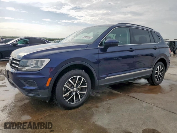2021 Volkswagen Tiguan SE with VIN 3VV2B7AX6MM051899, listed as a Copart auction lot 62870765 with 56,848 mi miles and Clean title. Bid and sale history available at DreamBid. Image 1.