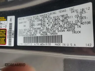 2013 Toyota Tacoma z VIN 5TFNX4CN2DX020635, wystawiony jako Copart lot #54427725 z przebiegiem 107 500 mil mil oraz Szkoda całkowita • Salvage title. Historia ofert i sprzedaży dostępna na DreamBid. Obrazek 12.