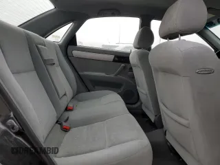 2005 Suzuki Forenza S z VIN KL5JD56Z65K100830, wystawiony jako Copart lot #85256494 z przebiegiem 74 543 mil mil oraz Tytuł czysty. Historia ofert i sprzedaży dostępna na DreamBid. Obrazek 10.