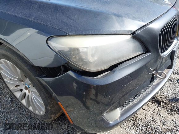 2012 BMW 7 Series 750Li xDrive with VIN WBAKC8C55CC436123, listed as a IAAI auction lot 41779443 with 126,618 mi miles and . Bid and sale history available at DreamBid. Image 12.