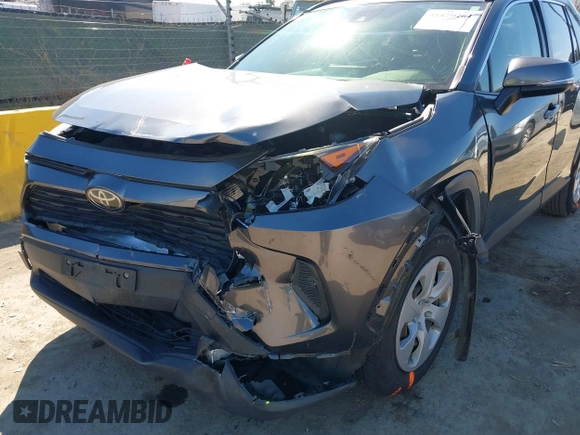 2019 Toyota RAV4 LE with VIN JTMG1RFV3KD025974, listed as a IAAI auction lot 41879264 with 131,933 mi miles and . Bid and sale history available at DreamBid. Image 6.
