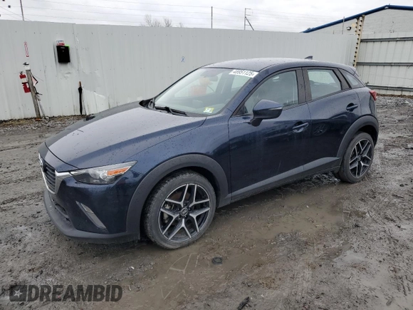 2017 Mazda CX-3 Touring with VIN JM1DKFC71H0164263, listed as a Copart auction lot 48951125 with 96,989 mi miles and Clean Title. Bid and sale history available at DreamBid. Image 1.