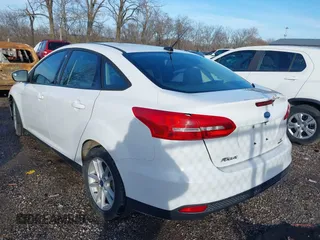 2016 Ford Focus SE with VIN 1FADP3F28GL348103, listed as a IAAI auction lot 41185718 with 69,256 mi miles. Bid and sale history available at carsss.com. Image 3.