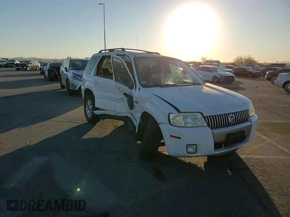 2005 Mercury Mariner Luxury z VIN 4M2CU56175DJ16949, wystawiony jako Copart lot #41901845 z przebiegiem 104 948 mil mil oraz Szkody całkowita. Historia ofert i sprzedaży dostępna na DreamBid. Obrazek 11.