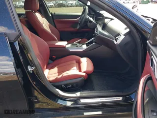 2024 BMW i4 xDrive40 with VIN WBY83FB04RFT19615, listed as a IAAI auction lot 41679918 with 3,883 mi miles. Bid and sale history available at carsss.com. Image 5.