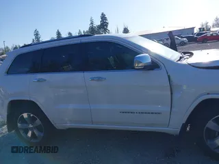 2015 Jeep Grand Cherokee Overland with VIN 1C4RJFCT6FC653386, listed as a IAAI auction lot 42084723 with 101,993 mi miles. Bid and sale history available at carsss.com. Image 13.