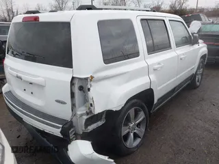 2016 Jeep Patriot Latitude with VIN 1C4NJPFAXGD749306, listed as a IAAI auction lot 41474439 with 94,767 mi miles and . Bid and sale history available at DreamBid. Image 4.