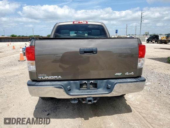 2010 Toyota Tundra with VIN 5TFDW5F12AX123529, listed as a Copart auction lot 60132615 with 264,205 mi miles and Clean title. Bid and sale history available at DreamBid. Image 6.
