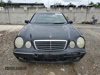 2000 Mercedes-Benz E-Class with VIN WDBJF70J1YB019224, listed as a Copart auction lot 77997574 with 0 mi miles and Non Repairable. Bid and sale history available at carsss.com. Image 5.