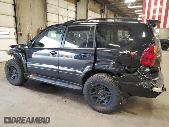 2004 Lexus GX 470 with VIN JTJBT20X740025411, listed as a Copart auction lot 55363145 with 329,164 mi miles and Salvage Title. Bid and sale history available at DreamBid. Image 2.