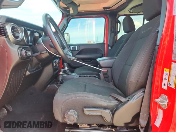 2020 Jeep Wrangler Unlimited Sahara with VIN 1C4HJXEN0LW115812, listed as a Copart auction lot 65534905 with 40,677 mi miles and Clean title. Bid and sale history available at DreamBid. Image 7.