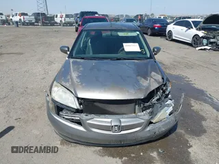 2004 Honda Civic with VIN JHMES96674S020013, listed as a IAAI auction lot 41827411 with 118,601 mi miles. Bid and sale history available at carsss.com. Image 12.