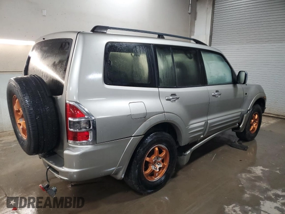 2001 Mitsubishi Montero Limited z VIN JA4MW51R71J038583, wystawiony jako Copart lot #83024384 z przebiegiem 157 538 mil mil oraz Szkoda całkowita • Salvage title. Historia ofert i sprzedaży dostępna na DreamBid. Obrazek 3.