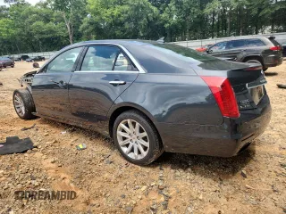 2014 Cadillac CTS RWD with VIN 1G6AP5SX7E0154156, listed as a Copart auction lot 62586325 with 83,818 mi miles and Salvage title. Bid and sale history available at DreamBid. Image 2.