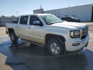 2017 GMC Sierra 1500 Denali with VIN 3GTU2PEJ3HG128374, listed as a Copart auction lot 47121155 with 214,373 mi miles and Salvage Title. Bid and sale history available at DreamBid. Image 4.
