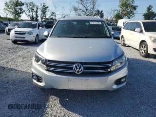 2012 Volkswagen Tiguan SE with VIN WVGAV7AX9CW607599, listed as a Copart auction lot 51214455 with 131,109 mi miles and Salvage Title. Bid and sale history available at DreamBid. Image 5.