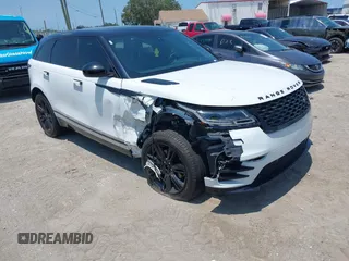 2020 Land Rover Range Rover Velar R-Dynamic S z VIN SALYK2EX9LA252092, wystawiony jako IAAI lot #42190295 z przebiegiem 69 440 mil mil oraz . Historia ofert i sprzedaży dostępna na DreamBid. Obrazek 1.