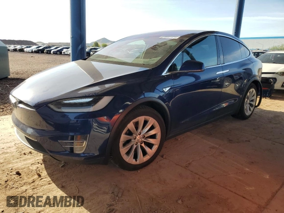 2016 Tesla Model X 70D z VIN 5YJXCBE22GF003067, wystawiony jako Copart lot #56051345 z przebiegiem 126 113 mil mil oraz Szkody całkowita. Historia ofert i sprzedaży dostępna na DreamBid. Obrazek 1.