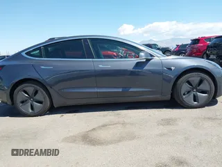 2019 Tesla Model 3 Long Range with VIN 5YJ3E1EB9KF386047, listed as a IAAI auction lot 42215362 with 41,246 mi miles and . Bid and sale history available at DreamBid. Image 14.